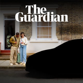 A couple use their phone to book a car club vehicle from the pavement, but the car is removed from the image. The Guardian logo sits at the top of the image.