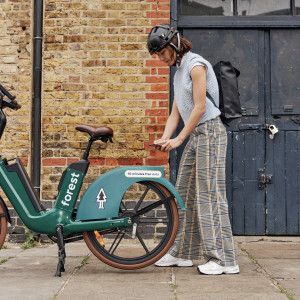 Rider scans a QR code to access a shared bike