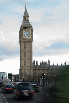 Traffic passes the Houses of Parliament