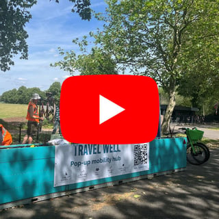 Youtube symbol on top of an image of the Nottingham pop-up hub. Press to play the two videos of the hub events.