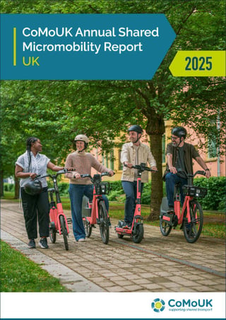 Front cover of the CoMoUK Annual Shared Micromobility Report 2025 featuring four shared e-bike and e-scooter riders talking side by side of a path